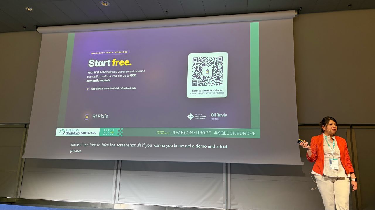 A speaker on stage at FabCon Europe beside a screen headed Start free, with a QR code on the right that reads Scan to schedule a demo, a walkthrough with the founder.